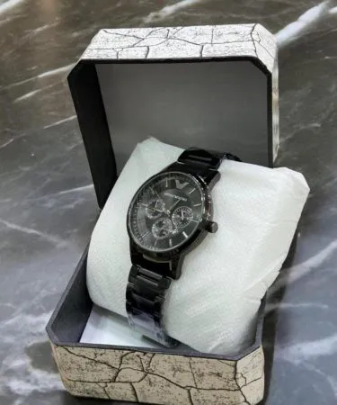 Men's black chronograph watch with rose gold dial and steel chain strap**