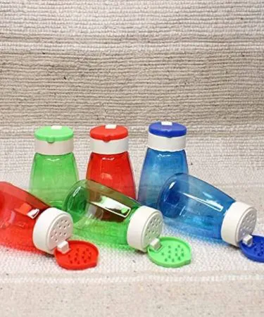 2‑piece stainless steel salt bottle set with adjustable holes and free salt – Khareedo , imagecaption=Elegant kitchen salt dispenser set with complimentary salt, perfect for Pakistani homes ,