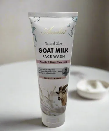 Amelia Goat Milk Face Wash 100ml bottle with natural goat milk droplets, soft pastel background