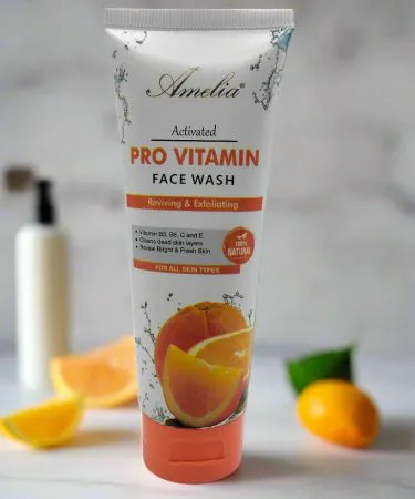 Amelia Pro Vitamin Face Wash 100ml bottle with fresh vitamin ingredients, bright background