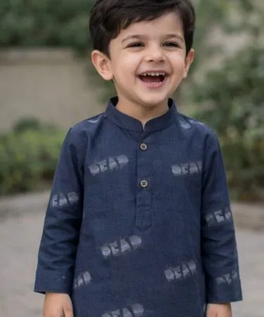 Printed kurta for boy with matching pajama in vibrant colors, imagecaption=Stylish printed kurta and pajama set for boys – perfect for festivals and parties,