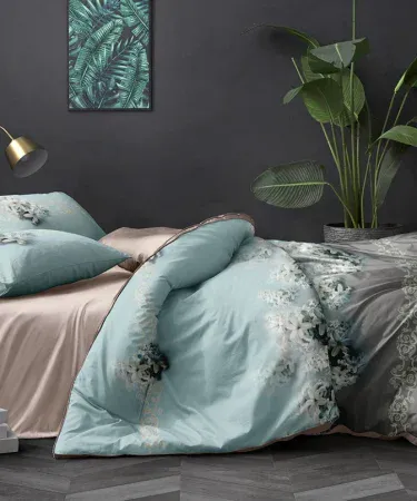 King size double bedsheet set with two soft pillows on a neatly made bedroom bed, imagecaption=Luxurious King Size Double Bedsheet Set with 2 Pillows – perfect for a cozy and stylish bedroom,