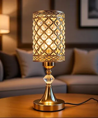 Elegant gold crystal table lamp with clear K9 beads emitting soft warm light for bedroom and living room décor