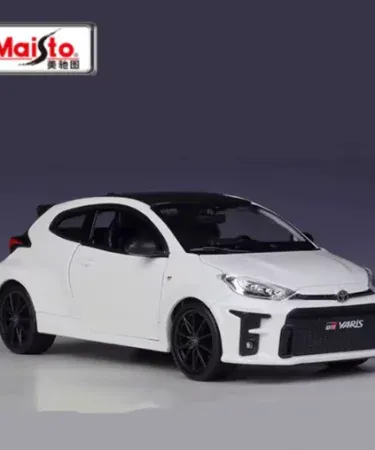 Maisto Toyota GR Yaris 1:24 diecast model car in red and white, detailed interior, opening side doors, free‑rolling sport rims, high‑quality paint finish, imagecaption=Maisto Toyota GR Yaris 1:24 scale diecast – official licensed collectible model displayed in its window box.