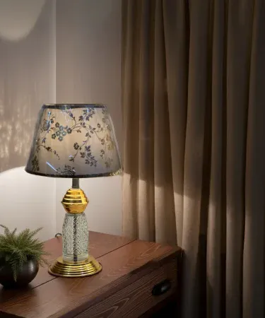 Golden and black vintage table lamp with sleek base and shade, perfect for fancy gifts and home décor