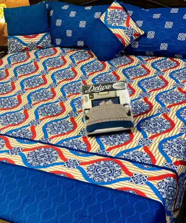 4‑piece 3D crystal cotton king size double bedsheet set with two pillow covers and one cushion cover displayed on a stylish bedroom