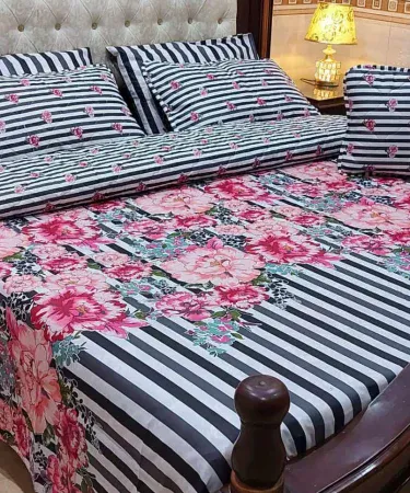 7‑Piece Quilted Comforter Set with King‑Size Bedsheet – luxurious winter bedding set displayed on a king‑size bed in a modern Pakistani bedroom