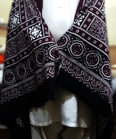Premium Sindhi Ajrak and cotton shawl collection featuring handcrafted block‑print patterns for men, women and girls – elegant cultural wear