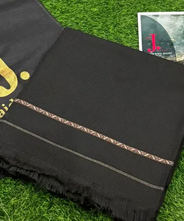 J. Mardana soft wool shawl in vibrant colors, neatly packed in a stylish bag