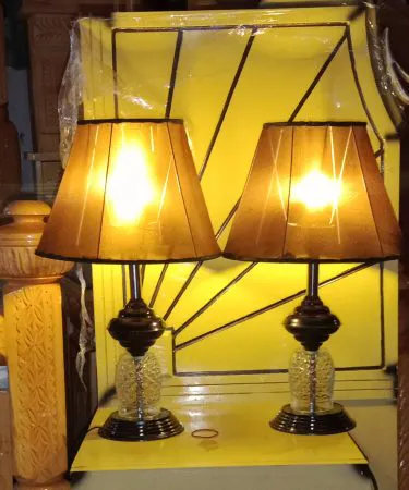 black and golden table lamp set with sleek black fabric shade and glowing golden glass sphere, perfect for bedroom and living room décor