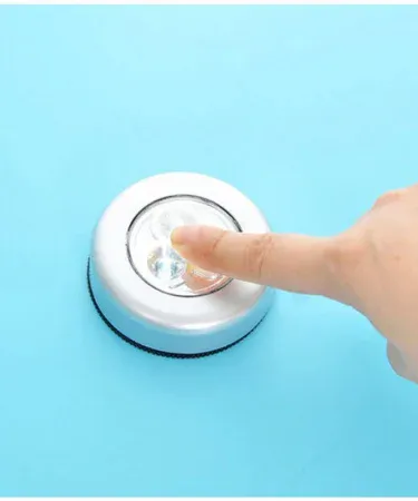 3‑Tap LED Light battery‑operated night lamp for kitchen cabinets and outdoor use, imagecaption=Compact peel‑and‑stick 3‑Tap LED night light – perfect for cabinets, closets, and outdoor lighting.