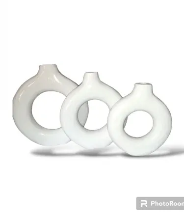 hand‑made set of three donut shaped vases in mate colour, painted plaster of Paris décor piece