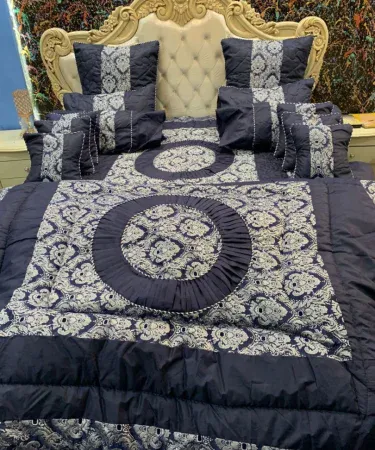 Bridal Vicky 14‑piece Jacquard silk Razai set displayed on a beautifully made bed, luxurious silk fabric visible, premium Pakistani bedding, high‑quality stitching, elegant design.