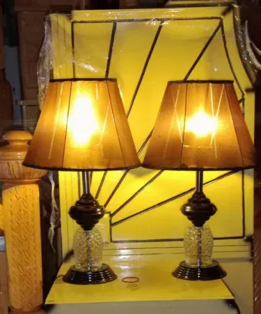 Set of two black and gold table lamps with night light feature for bedroom decoration , imagecaption=Elegant black and gold table lamps – perfect for bedroom and living room décor ,