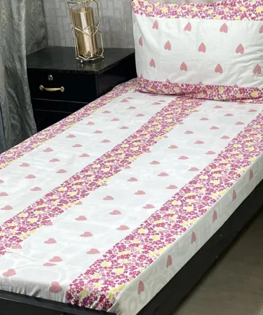 Premium single bed patchwork bedsheet with pillow cover – soft cotton fabric, designer embedded pattern, Khareedo & Kharedo, imagecaption=Premium single bed patchwork bedsheet with pillow cover – perfect for daily use and gifting, available on Khareedo & Kharedo.