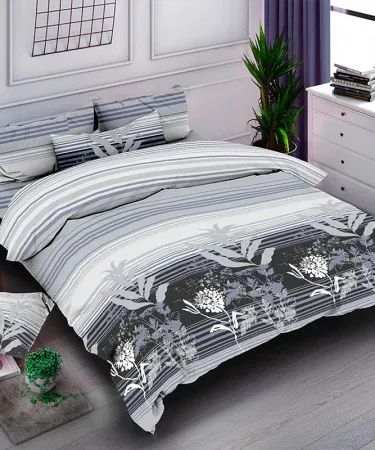 King size double bedsheet set with two plush pillows, soft luxury fabric, displayed on a neatly made bed in a modern bedroom.
