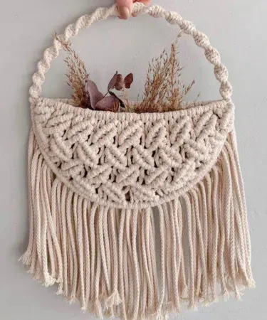 handmade macrame flower bag wall hanging with boho design, imagecaption=Elegant macrame flower bag wall hanging – perfect boho décor for any Pakistani home,