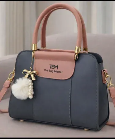 Premium Quality (TBM) The Bag Master high‑quality shoulder bag in 9 vibrant colors with lock and fur keychain