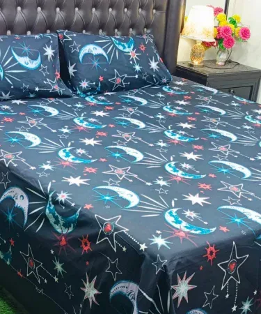 King size double bedsheet set with two plush pillows on a neatly made bed, showcasing luxurious cotton blend fabric and elegant design.