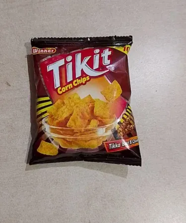 Tik​it corn chips (tikka bar b qué) 12 pcs pack – crunchy Pakistani snack in a sealed bag