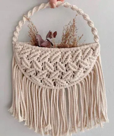 handmade macrame flower bag wall hanging with boho design, imagecaption=Elegant macrame flower bag wall hanging – perfect boho décor for any Pakistani home,