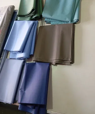 Men's unstitched shalwar kameez suit in assorted cotton fabrics, imagecaption=A collection of unstitched men's shalwar kameez suits in various attractive cotton fabrics, ready for custom tailoring.