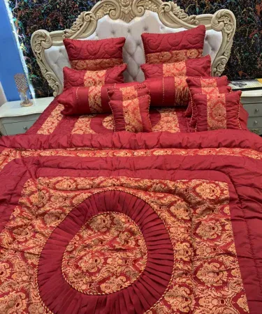Bridal Vicky 14‑piece Jacquard silk Razai set displayed on a beautifully made bed, luxurious silk fabric visible, premium Pakistani bedding, high‑quality stitching, elegant design.