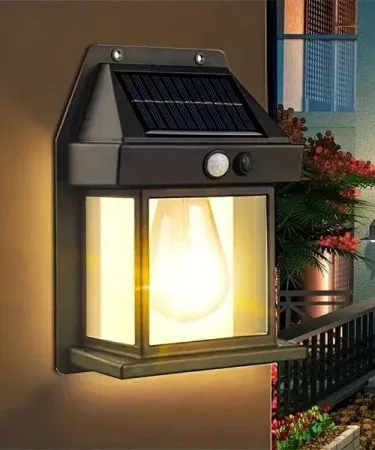 Solar Sensor Light – Waterproof Tungsten Filament Solar Wall Lamp with Motion Sensor, installed on an outdoor wall at dusk, showing bright filament illumination. , imagecaption=Solar Sensor Light – Intelligent induction wall lamp delivering bright, eco‑friendly lighting for gardens and patios.