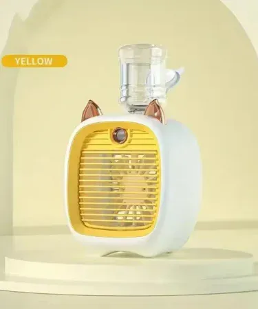 Cooling spray fan desktop USB mini portable air conditioner on a desk, imagecaption=Compact USB cooling spray fan – perfect for office, dormitory, and home use,