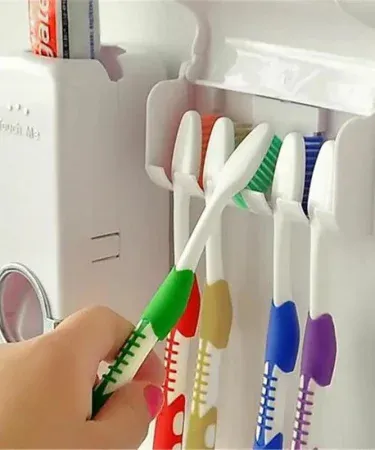 Wall‑mounted automatic toothpaste dispenser with 5 brush holder – hands‑free bathroom organizer