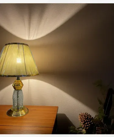 Elegant modern table lamp with rectangular deep grey glass shade and satin finish on a wooden desk, imagecaption=Elegant Modern Table Lamp – Deep Grey Satin Finish,