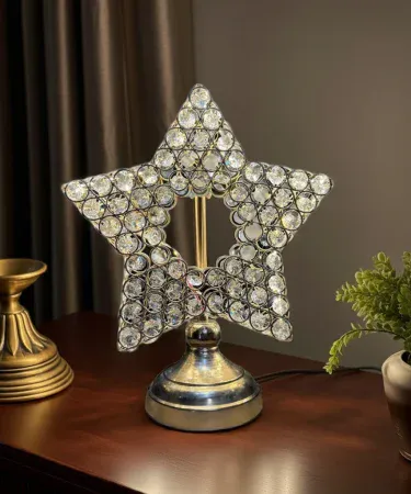 Crystal star‑shaped table lamp with gold metal base – elegant home décor piece, imagecaption=Elegant crystal star‑shaped table lamp – perfect for adding sparkle to any room.