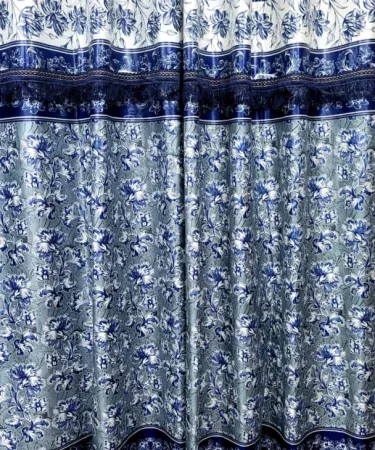 The Touch of Luxury crystal silk curtains draped elegantly in a modern bedroom, showcasing premium silk sheen and luxurious texture