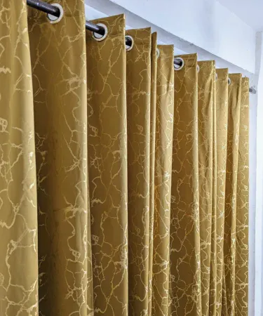 Gold textured sparkle curtains for living room and bedroom – luxurious home décor, imagecaption=Elegant gold textured curtains with subtle sparkle, perfect for living rooms and bedrooms – available on Khareedo & Kharedo.