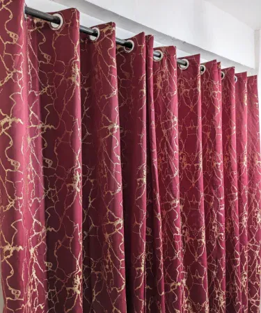 Elegant gold textured sparkle curtains hanging in a stylish living room, imagecaption=Elegant gold textured sparkle curtains – perfect for living rooms and bedrooms, available on Khareedo & Kharedo.