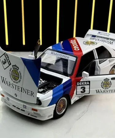 1:24 BMW M3 E30 diecast model with sound and LED light effects, pull‑back action, and openable doors, hood and trunk, imagecaption=Realistic 1:24 scale BMW M3 E30 supercar alloy diecast model – perfect for collectors and kids.
