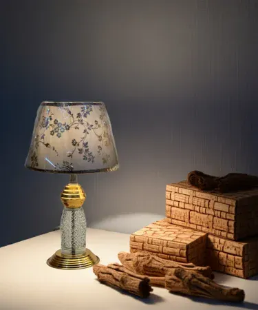 Golden and black vintage table lamp with sleek base and shade, perfect for fancy gifts and home décor