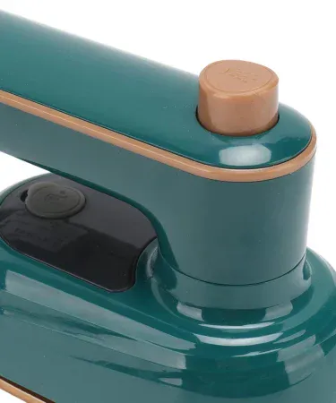 Abu Turab (أبو تراب) Handheld Mini Garment Steamer – portable foldable steam iron for home and travel, imagecaption=Abu Turab portable mini garment steamer displayed on a travel bag,