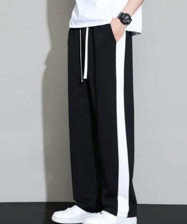 Men's black wide leg trousers with white side stripes – premium F/S Clothing, available on Khareedo|Kharedo , imagecaption=Premium black wide‑leg trousers with white side stripes for modern men – shop now on Khareedo|Kharedo ,