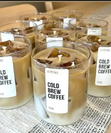 Scented Aromatherapy Candle in Glass Container for Home and Office Decoration, imagecaption=Elegant glass scented aromatherapy candle adding a calming glow to any space.