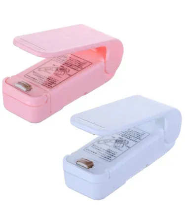Abu Turab Mini Heat Bag Sealing Machine portable sealer in pink, compact design for food bag sealing , imagecaption=Abu Turab (أبو تراب) Mini Heat Bag Sealing Machine – compact, portable heat sealer for airtight food bag closure.