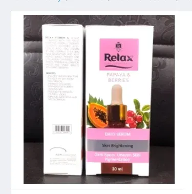 Relax UK Papaya & Berries Face Serum 30ml bottle with fresh papaya slices and berries on a clean white background