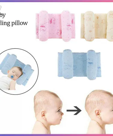 Newborn infant head shaping pillow anti‑heading memory foam pillow with breathable hypoallergenic cover, suitable for cribs, bassinets, and strollers.