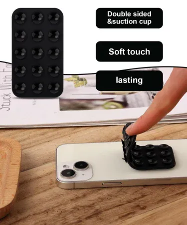 Abu Turab double side silicone mobile phone holder with suction cups mounted on a glass surface, showing hands‑free phone placement