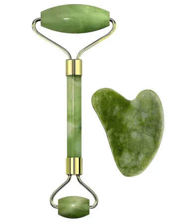 Abu Turab original stone jade roller and gua sha set – premium facial massager for skin, eyes and neck, placed on a marble vanity with a fresh flower