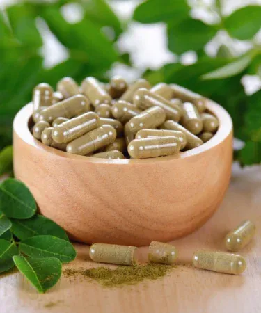 100 Moringa Capsules organic herbal supplement bottle, imagecaption=100 Moringa Capsules – natural weight loss, diabetes control, hair & skin health.