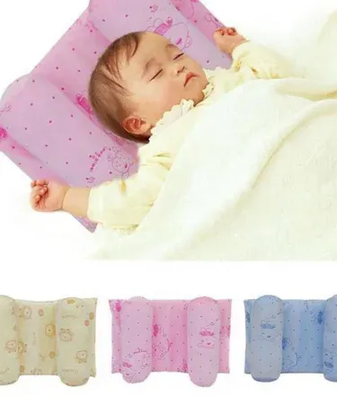 Newborn infant head shaping pillow anti‑heading memory foam pillow with breathable hypoallergenic cover, suitable for cribs, bassinets, and strollers.