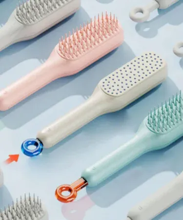 Abu Turab (أبو تراب) 2‑in‑1 anti‑scald hair straightener brush with ceramic heating plates and triangular teeth for fast styling