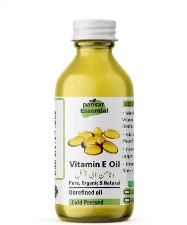 Pure Vitamin E Oil bottle with dropper, highlighting its natural benefits for skin and hair care.**