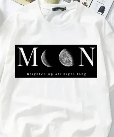 Lost in the Moon T‑Shirt featuring a sleek moon graphic and bold “MOON” text on soft cotton fabric